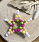 Preview: Greifling Silikon *Stern pastellrosa-lemon* ohne Namen