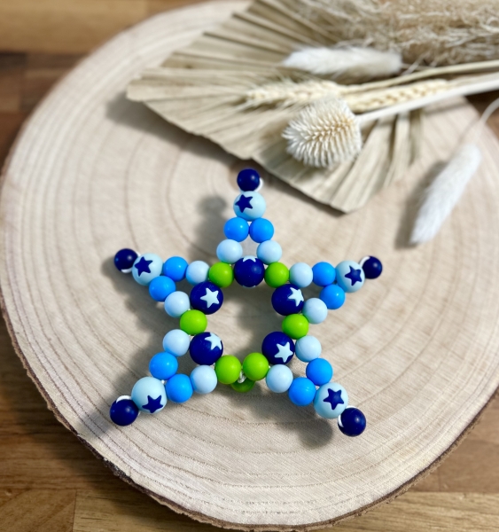 Greifling Silikon *Stern gelbgrün-babyblau* ohne Namen