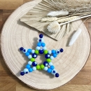 Greifling Silikon *Stern gelbgrün-babyblau* ohne Namen
